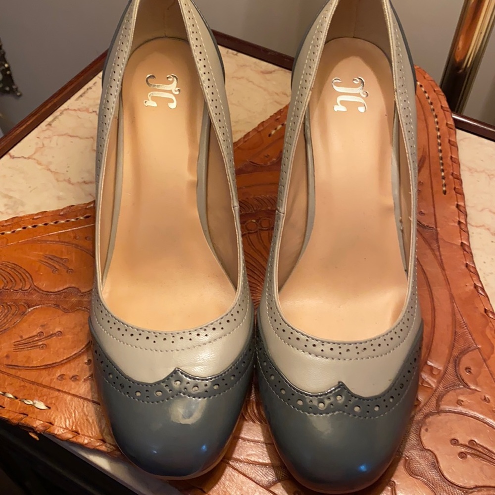 Gray Spectator heels. Brand new. No flaws or stains.